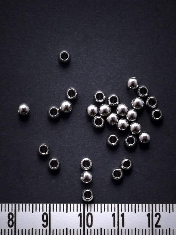 Perles d'acier inoxydable 4 mm (trou de 2 mm)