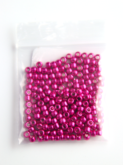 Perles de rocaille - rose métallisé 563 sachet